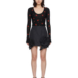Minigonna in taffetà con rose in nero 