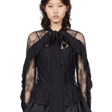 Top in pizzo con volant in nero 