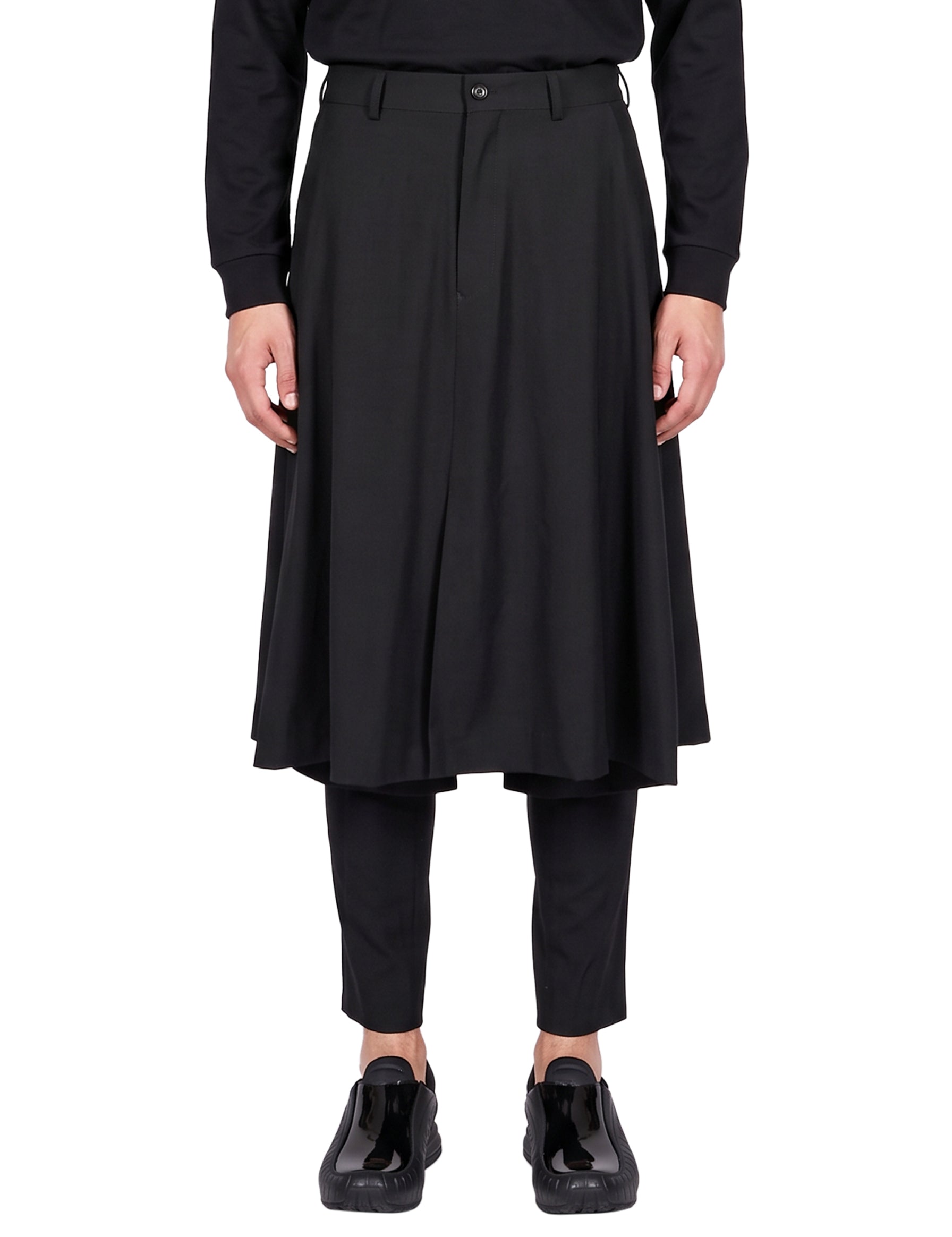 Pantaloni con gonna sovrapposta in nero 