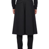 Pantaloni con gonna sovrapposta in nero 