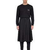 Pantaloni con gonna sovrapposta in nero 