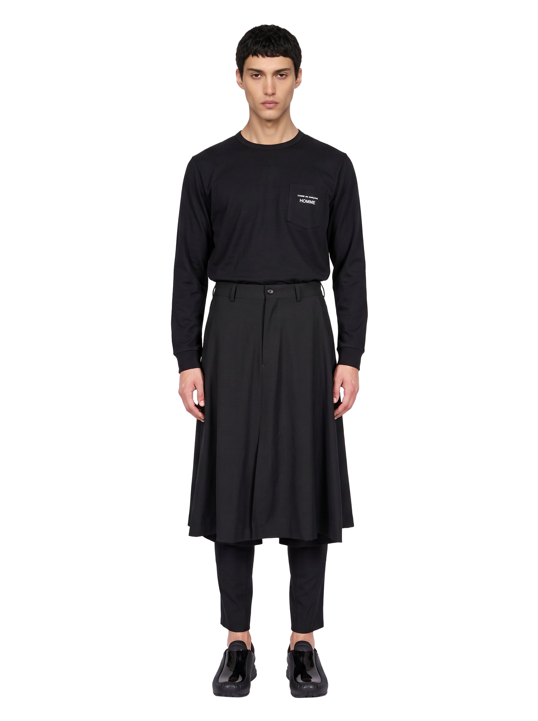 Pantaloni con gonna sovrapposta in nero 