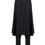 Pantaloni con gonna sovrapposta in nero 