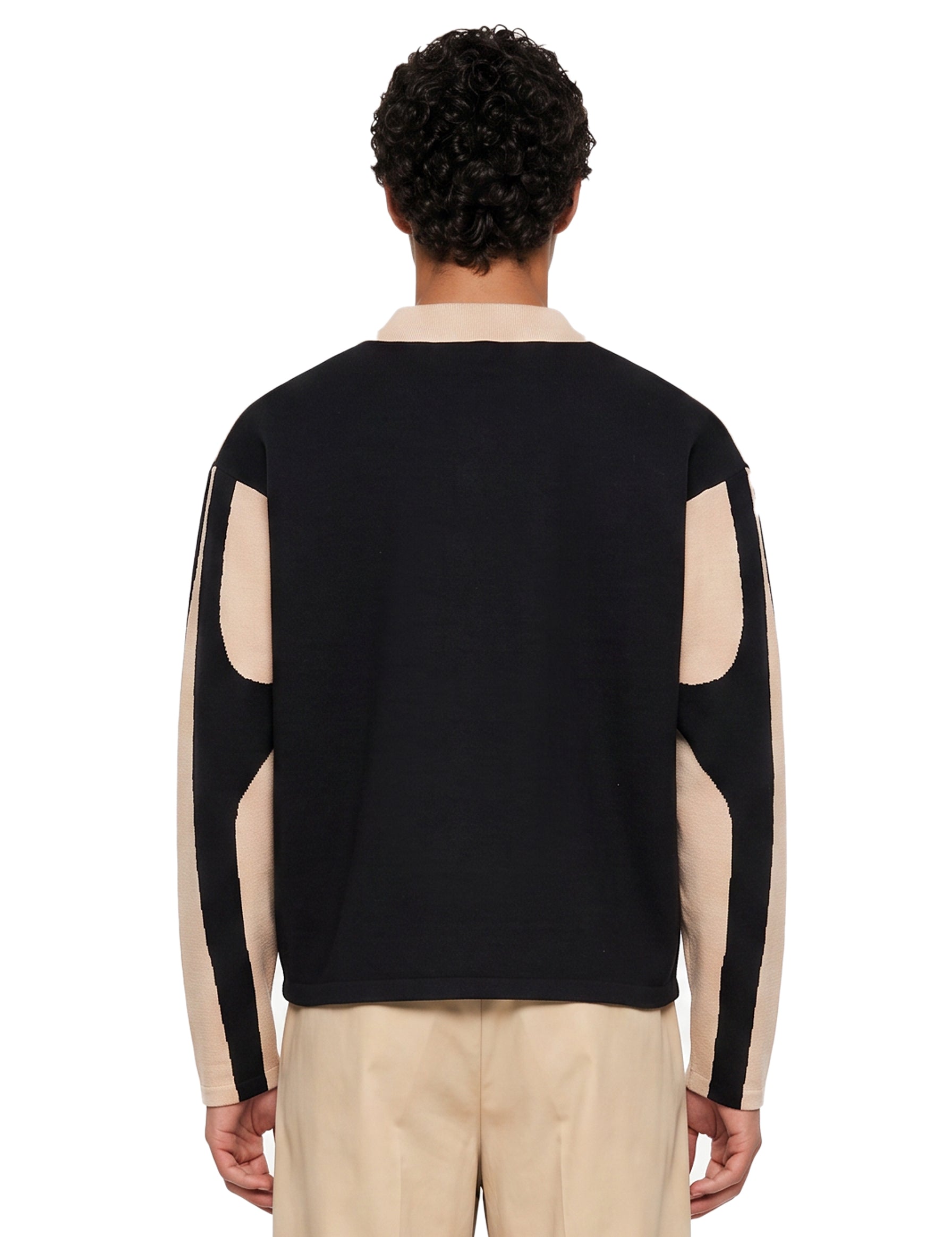Maglione bicolore con ricamo in nero 