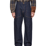 Jeans con impunture a contrasto in blu 