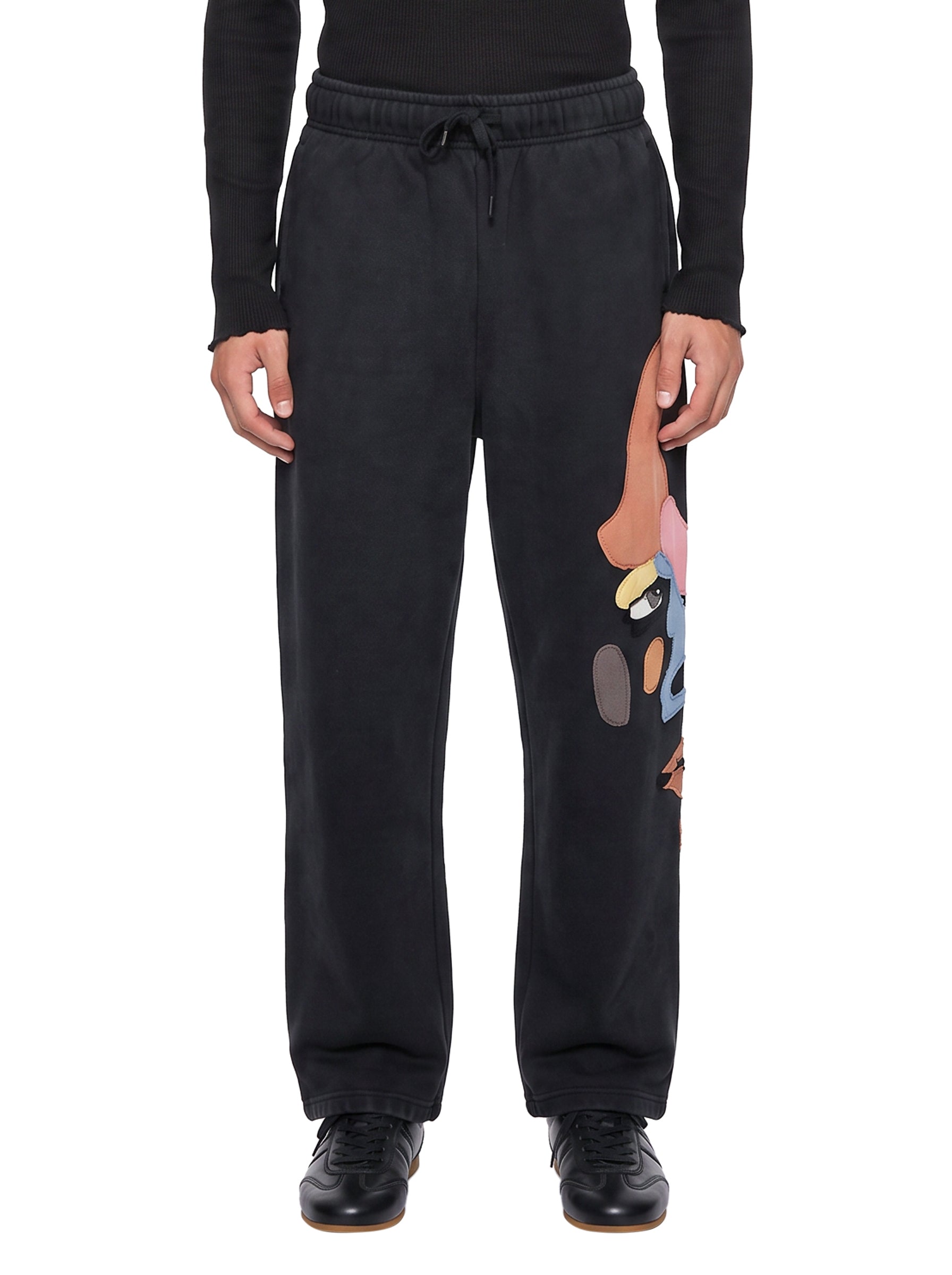Pantaloni tuta side eye in nero 