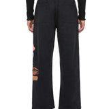 Pantaloni tuta side eye in nero 