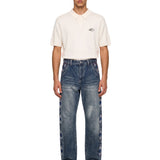 Jeans con ricamo occhio in blu 