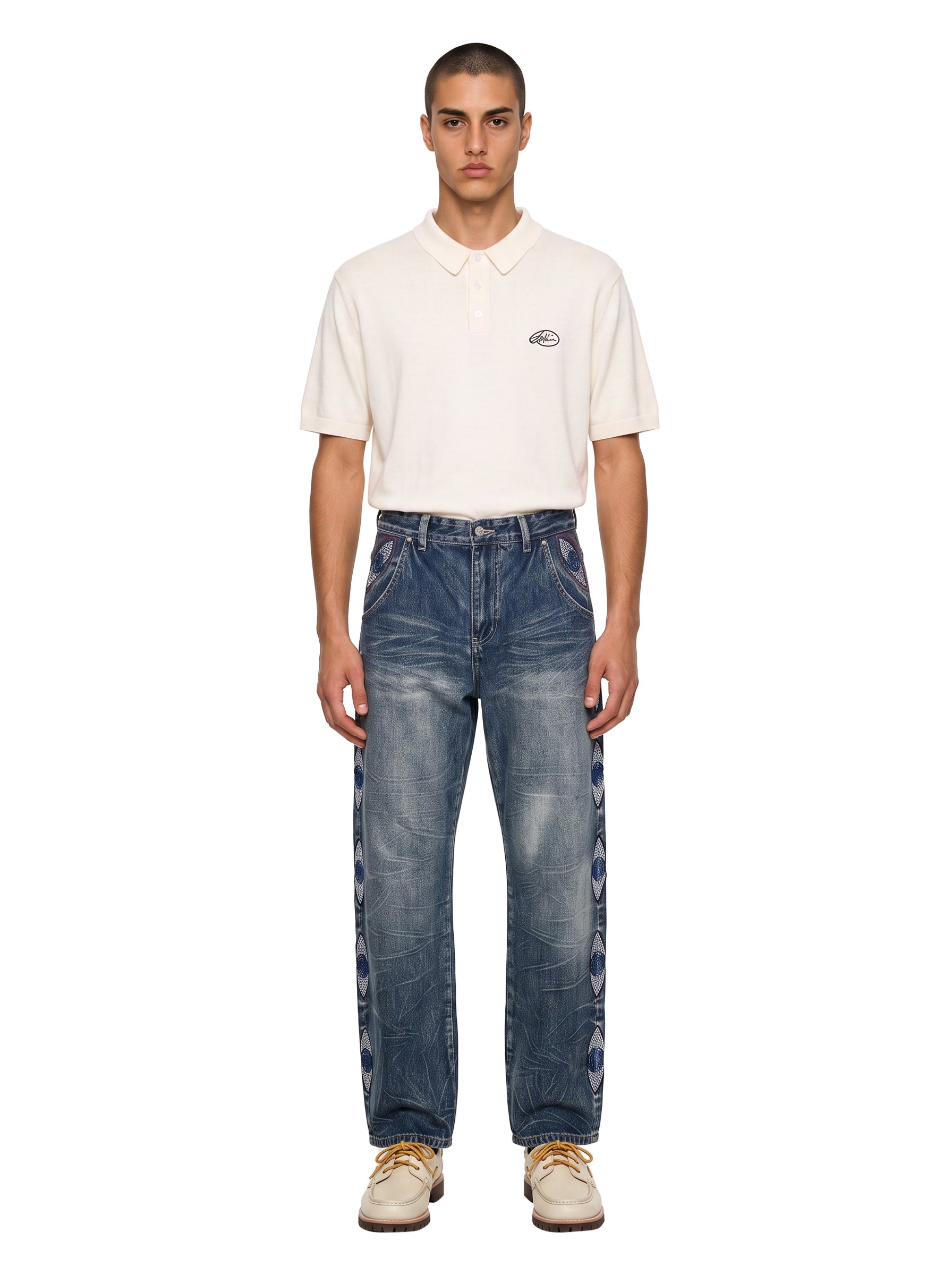 Jeans con ricamo occhio in blu 