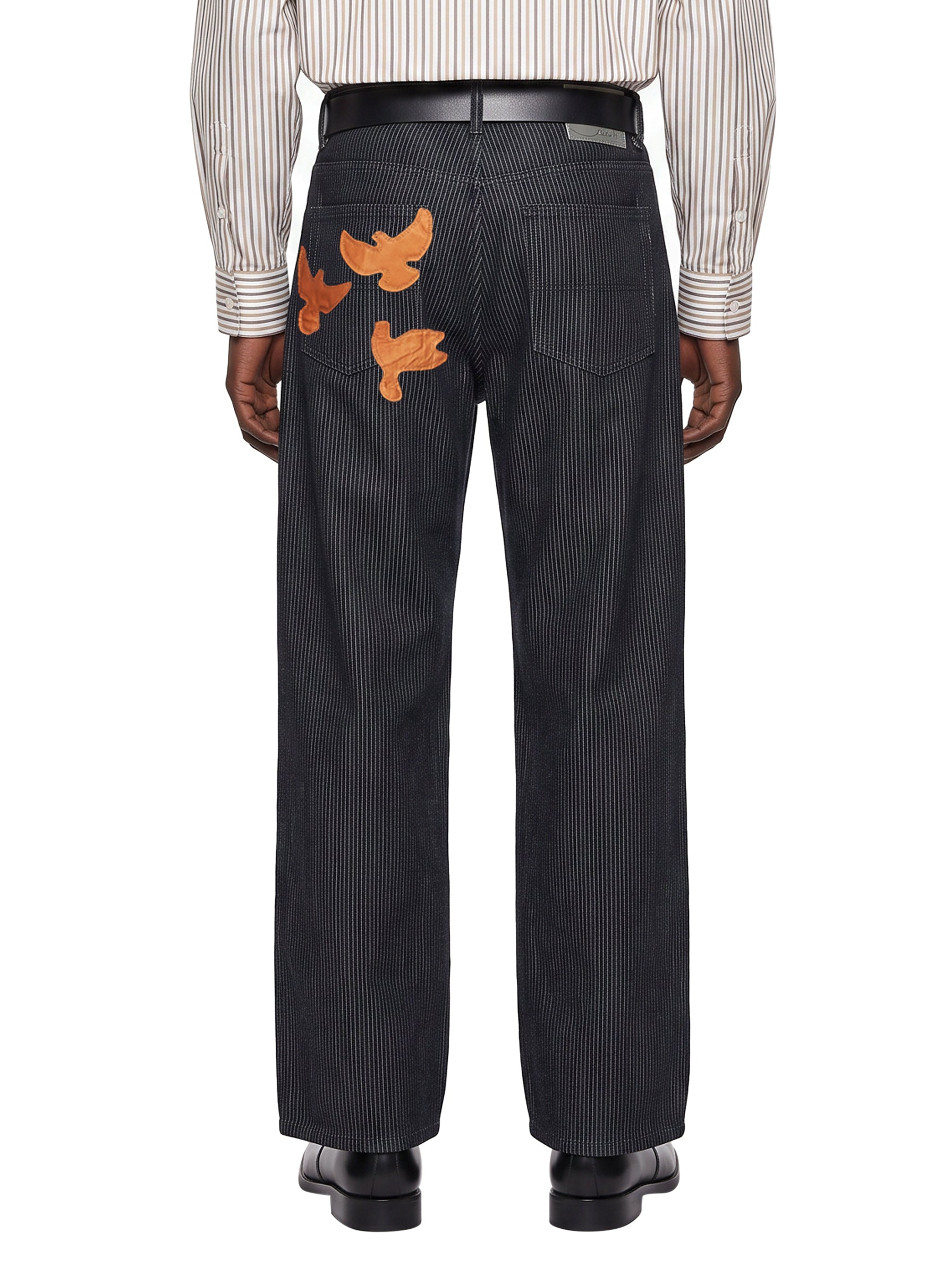 Jeans con stampa colombe in blu 