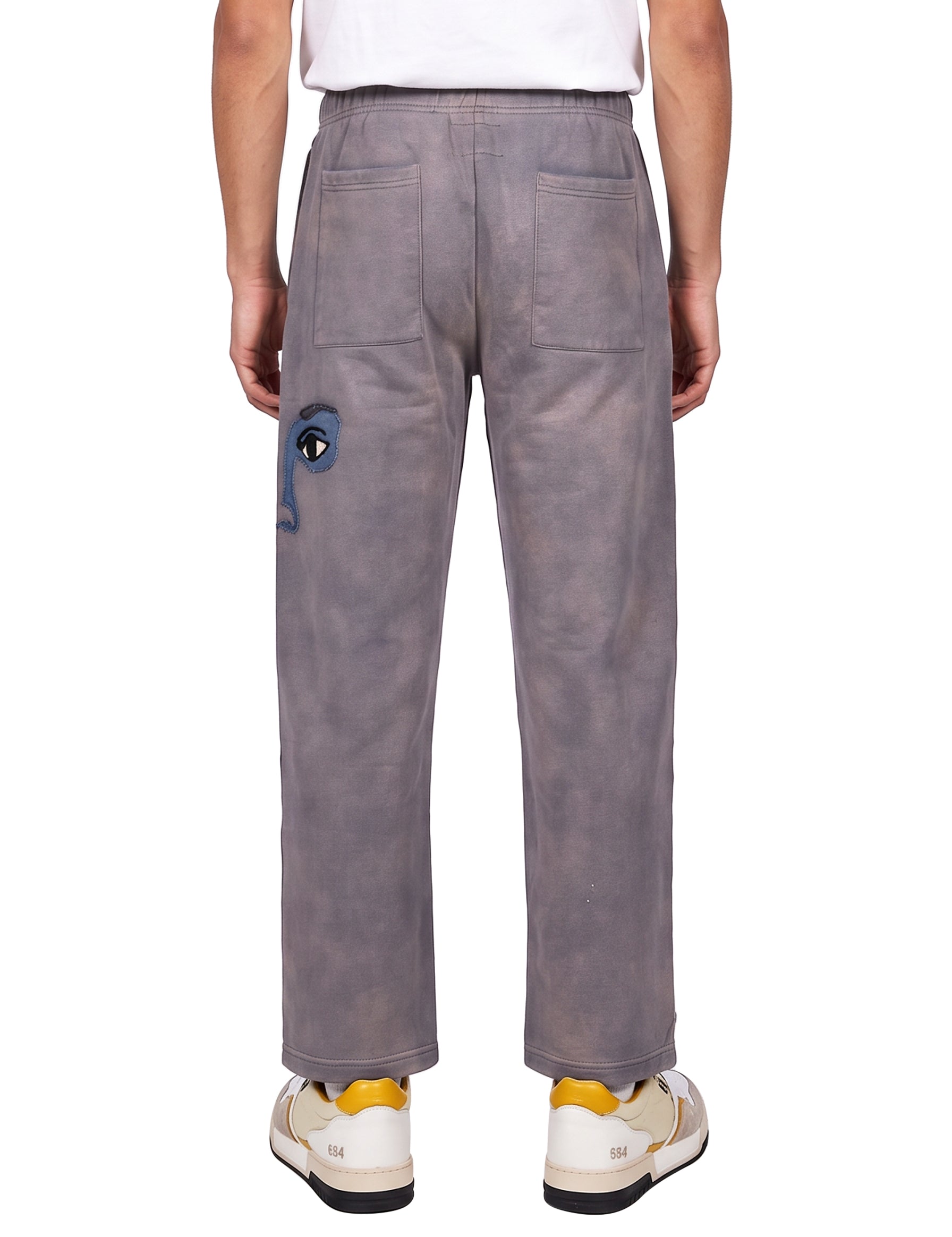 Pantaloni tuta con stampa in grigio 