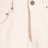 Jeans con bottoni in avorio 