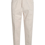 Jeans con bottoni in avorio 