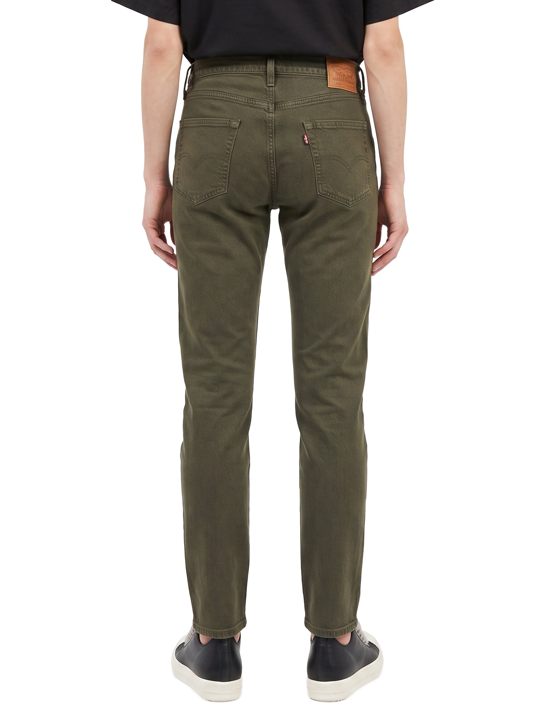 Jeans 502 Taper in marrone 
