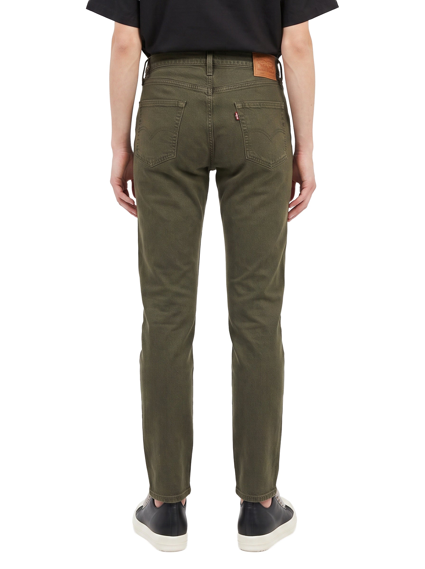Jeans 502 Taper in marrone 