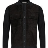 Giacca con inserti in pelle in nero 