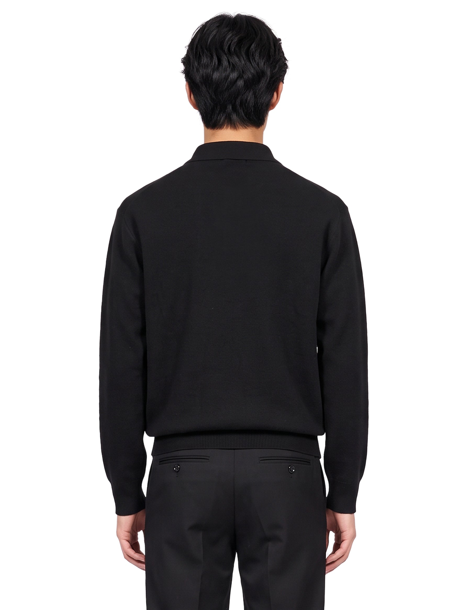 Polo manica lunga in nero 
