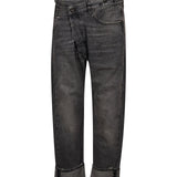 Jeans Leyton con design crossover in nero 