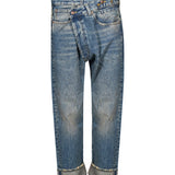 Jeans asimmetrico in blu 