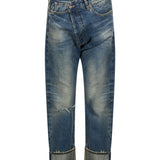 Jeans con chisura asimmetrica in blu 