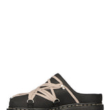 Mules Megalace in pelle in nero 