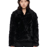 Giacca con scollo a V in shearling in nero 