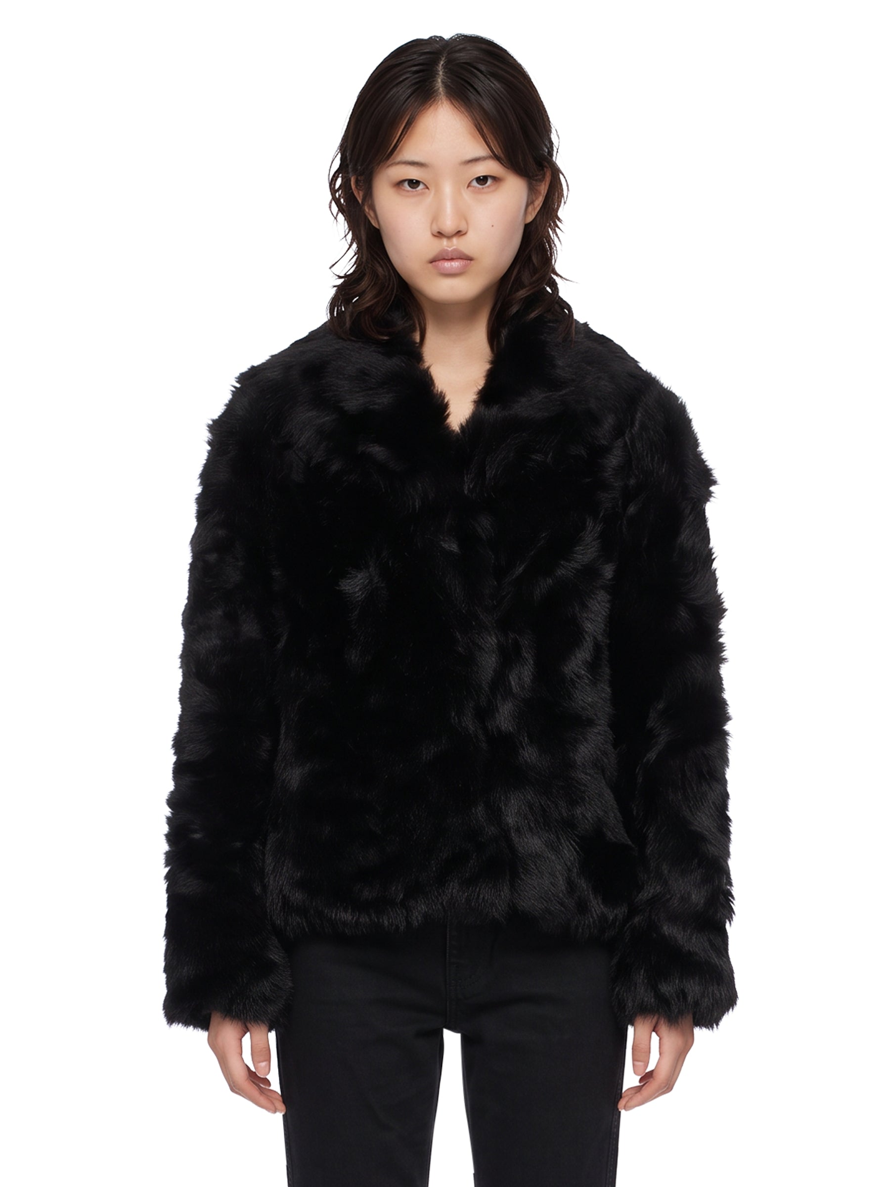 Giacca con scollo a V in shearling in nero 