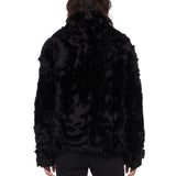 Giacca con scollo a V in shearling in nero 