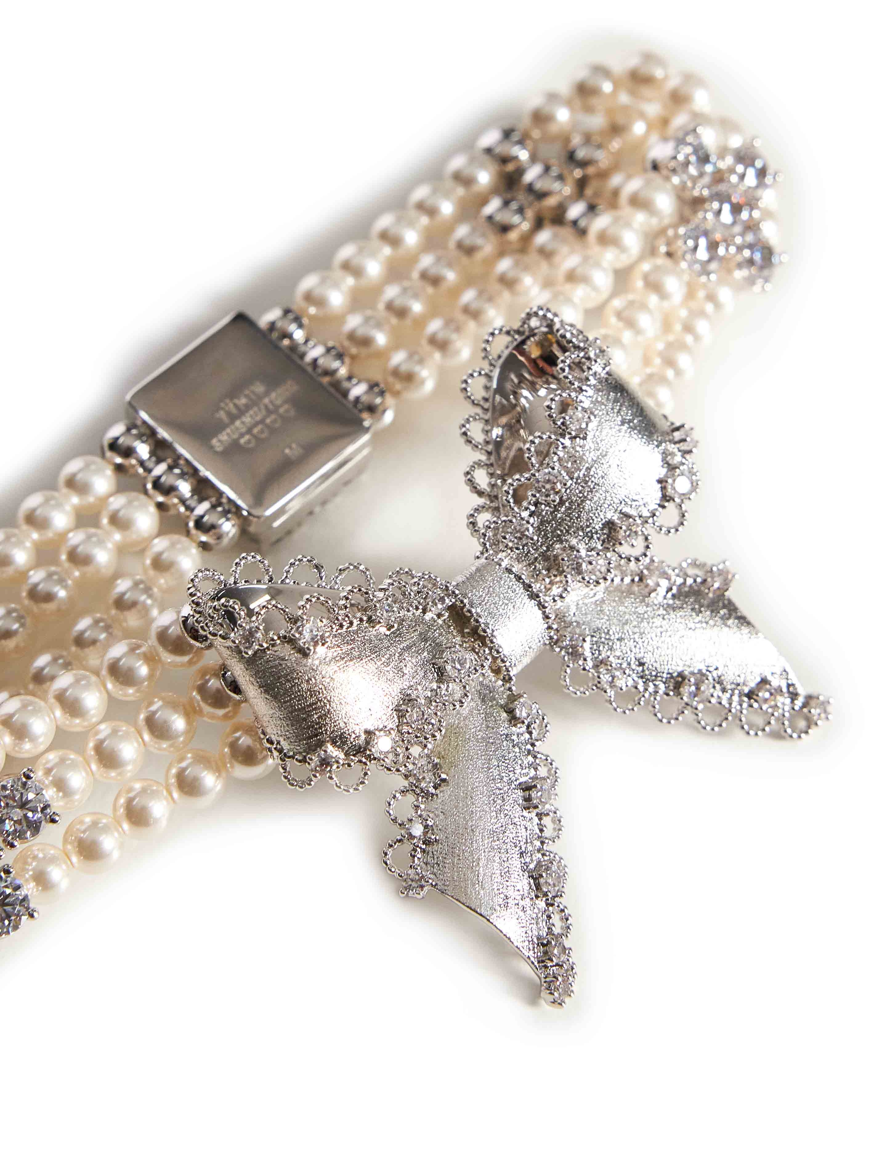 Bracciale con perle e cristalli in avorio 