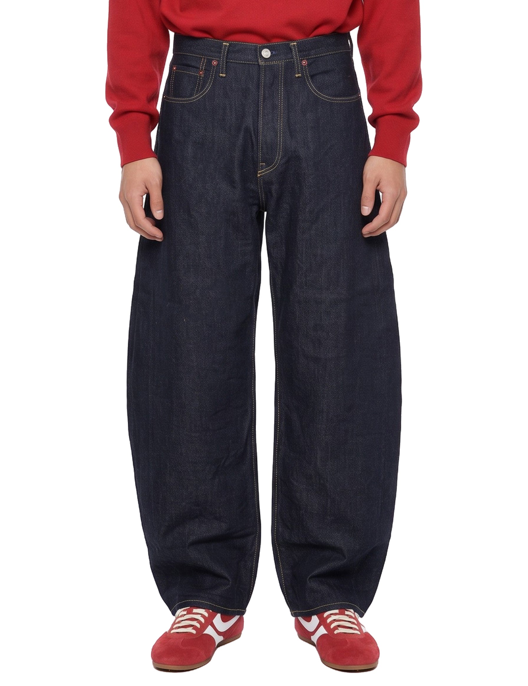 Jeans Deformation in blu scuro 