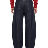 Jeans Deformation in blu scuro 