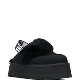 Mules Funkette con cinturino in nero 