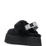 Mules Funkette con cinturino in nero 