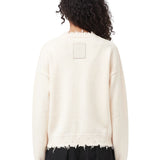 Maglione con orlo sfrangiato in avorio 