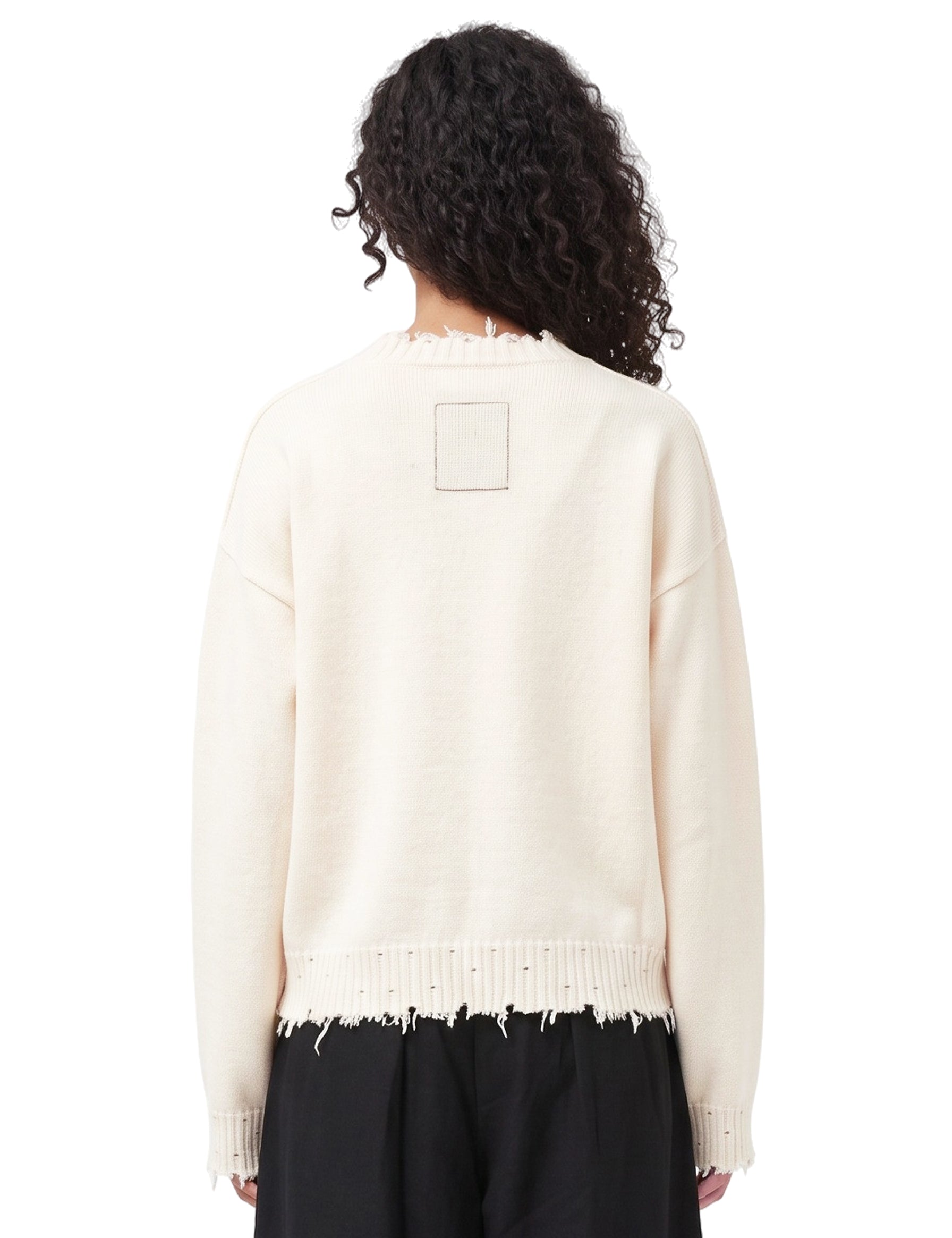 Maglione con orlo sfrangiato in avorio 