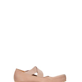 Ballerine in pelle con elastico incrociato in rosa cipria 