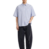 Camicia a righe in celeste 