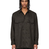 Blusa con taschino al petto in verde 