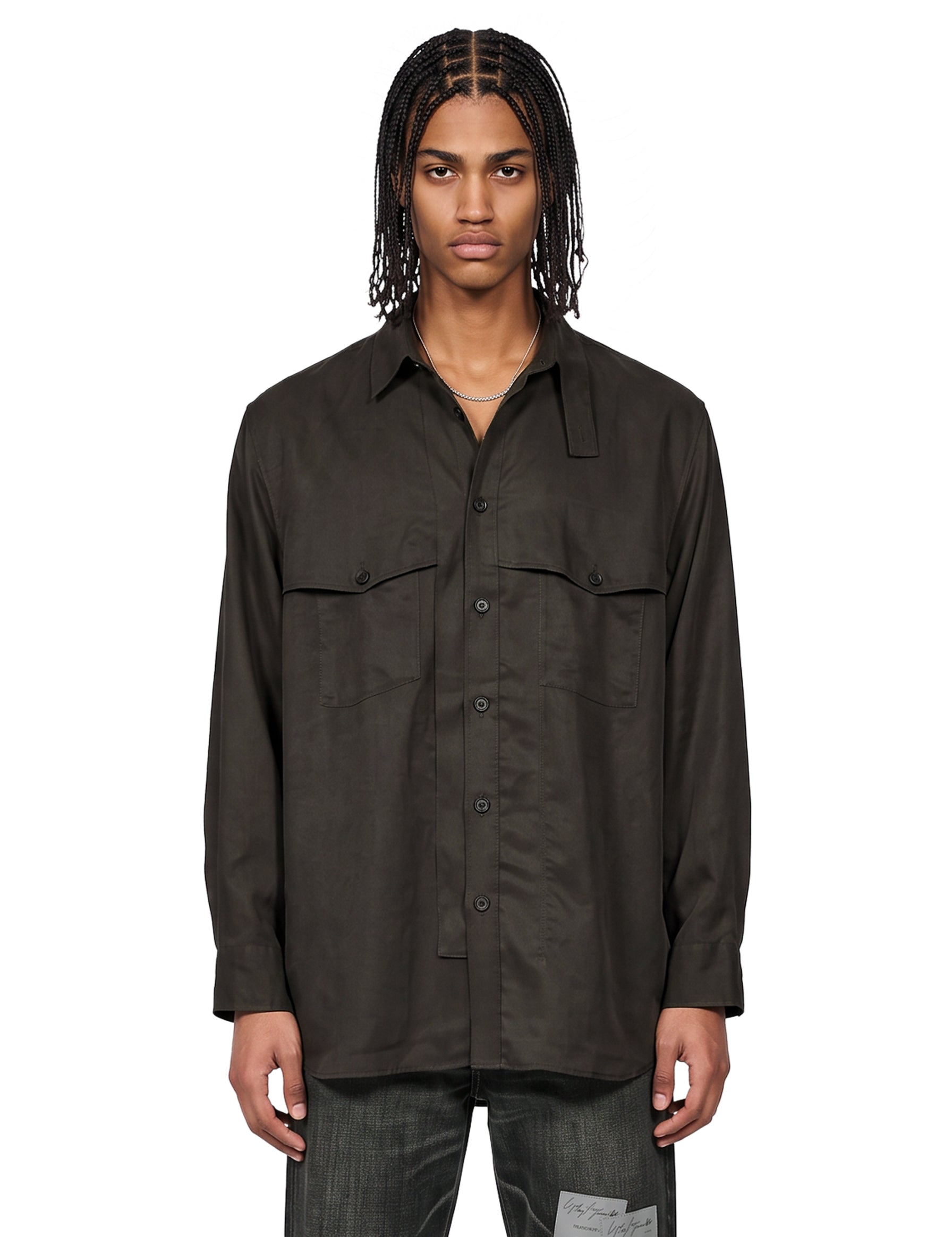 Blusa con taschino al petto in verde 