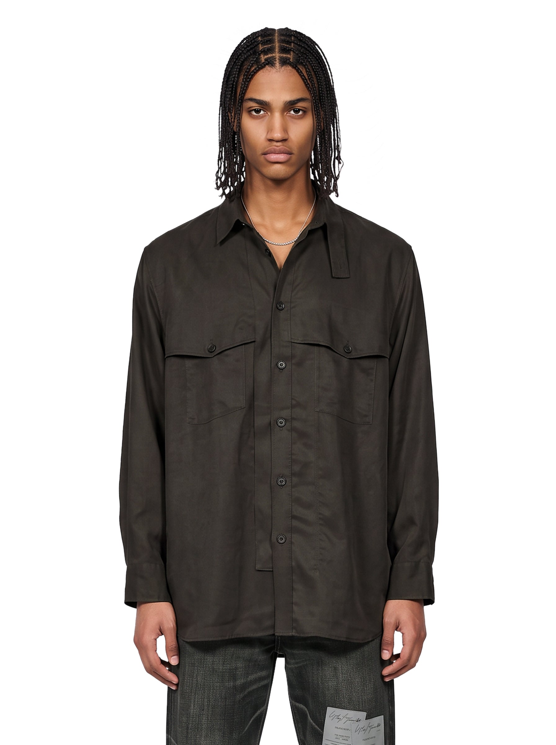 Blusa con taschino al petto in verde 
