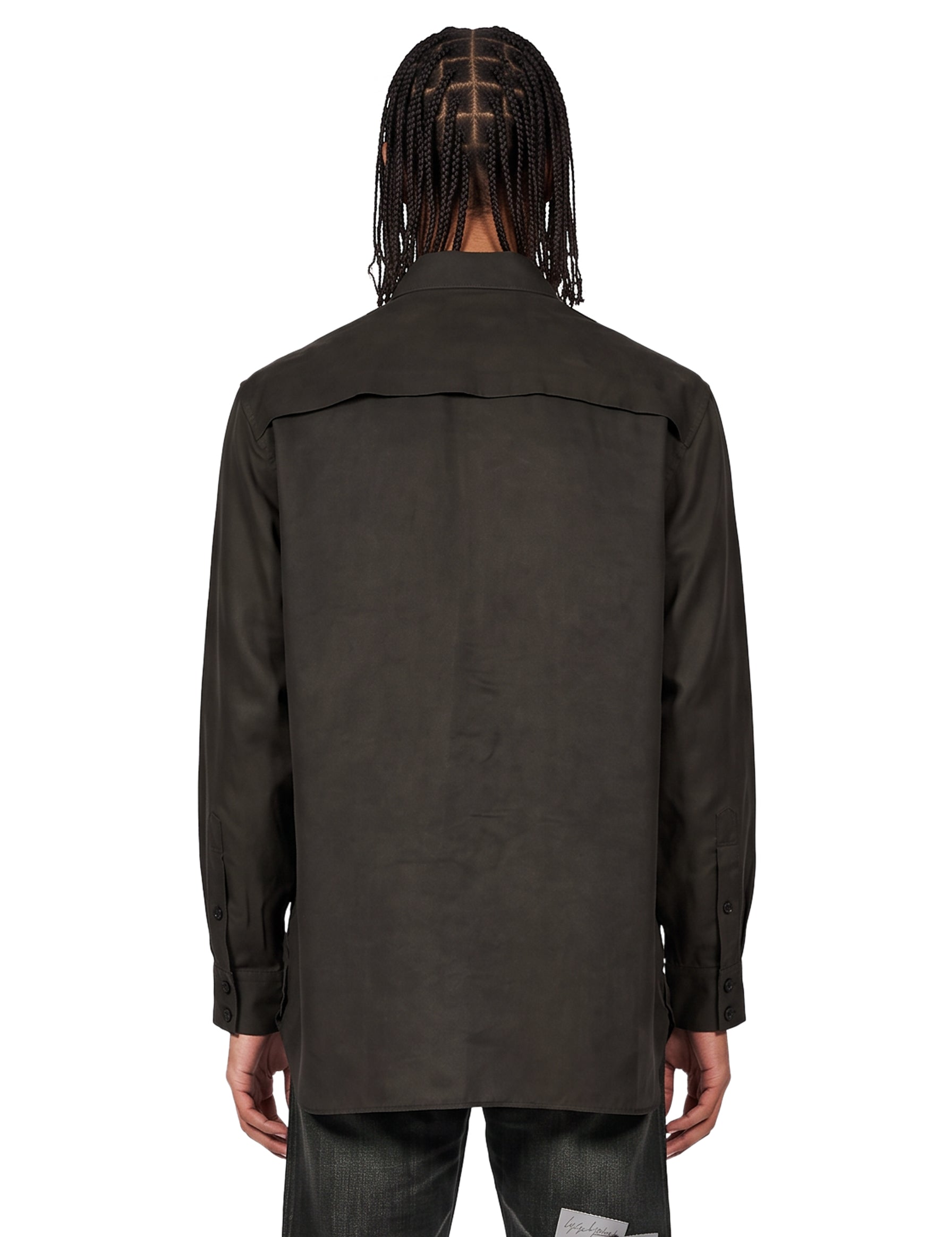 Blusa con taschino al petto in verde 
