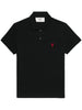Polo shirt with black embroidery - unisex