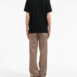 Polo con ricamo in nero - unisex 