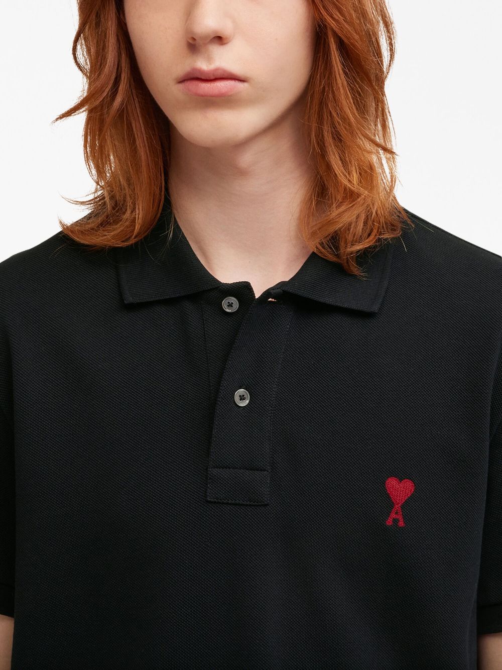 Polo con ricamo in nero - unisex 
