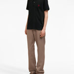 Polo con ricamo in nero - unisex 