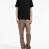 Polo con ricamo in nero - unisex 
