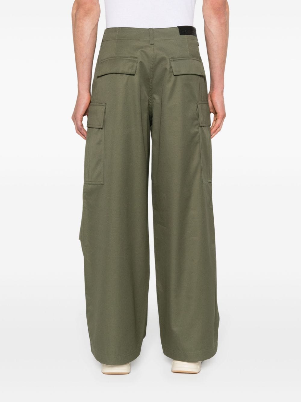 Pantaloni a gamba ampia in verde - uomo 