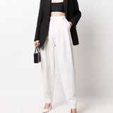 Pantaloni affusolati a vita alta in bianco - donna 