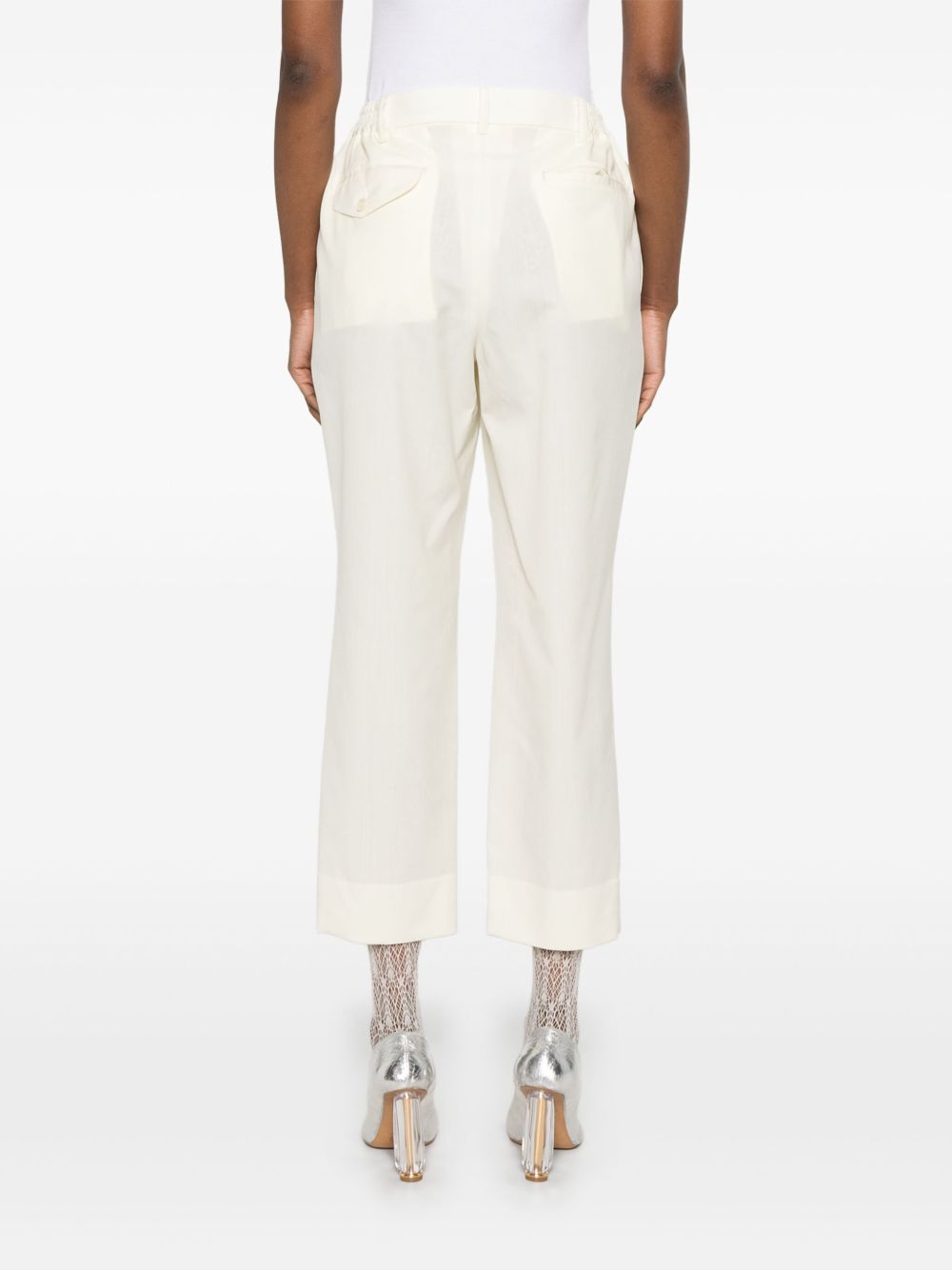 Pantaloni affusolati in bianco Comme Des Garçons - donna 
