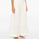 Pantaloni svasati in lana bianco Comme Des Garçons - donna 